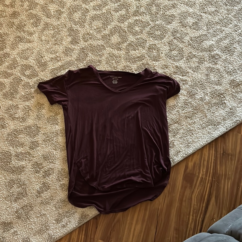 Maroon-ish brown cropped at the front long tee